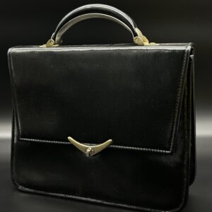 Walizeczka skórzana vintage z metalowym zapięciem