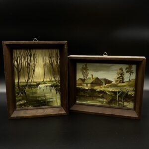 Zestaw dwóch obrazków w drewnianych ramach