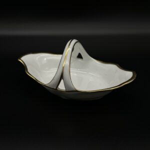Porcelanowa misa z uchwytem i pozłacanym brzegiem